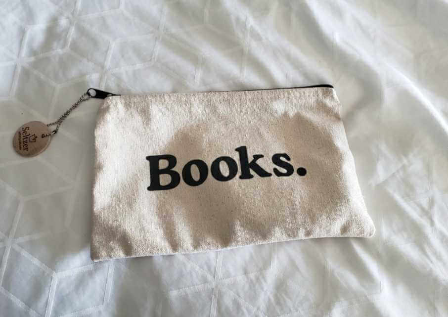 Image of a pouch with the word Books written on it.