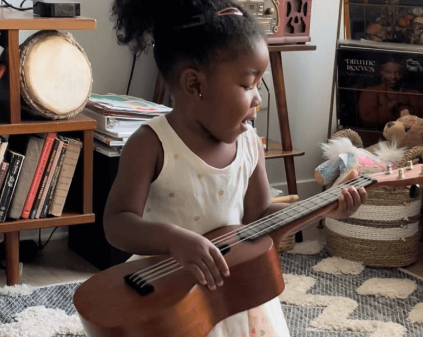 Young virtuoso playing string instrument