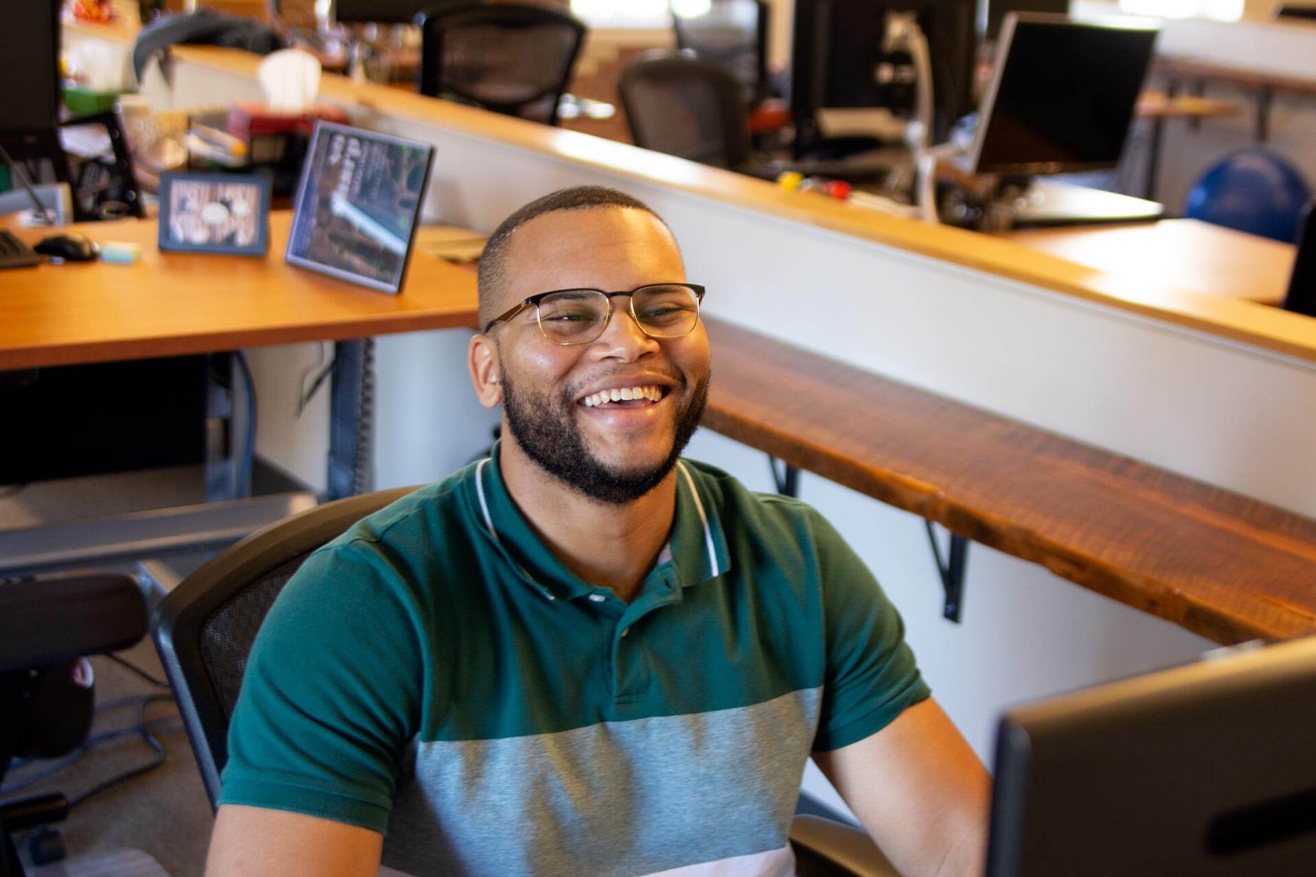 Caktus developer Christopher Dixon at his desk