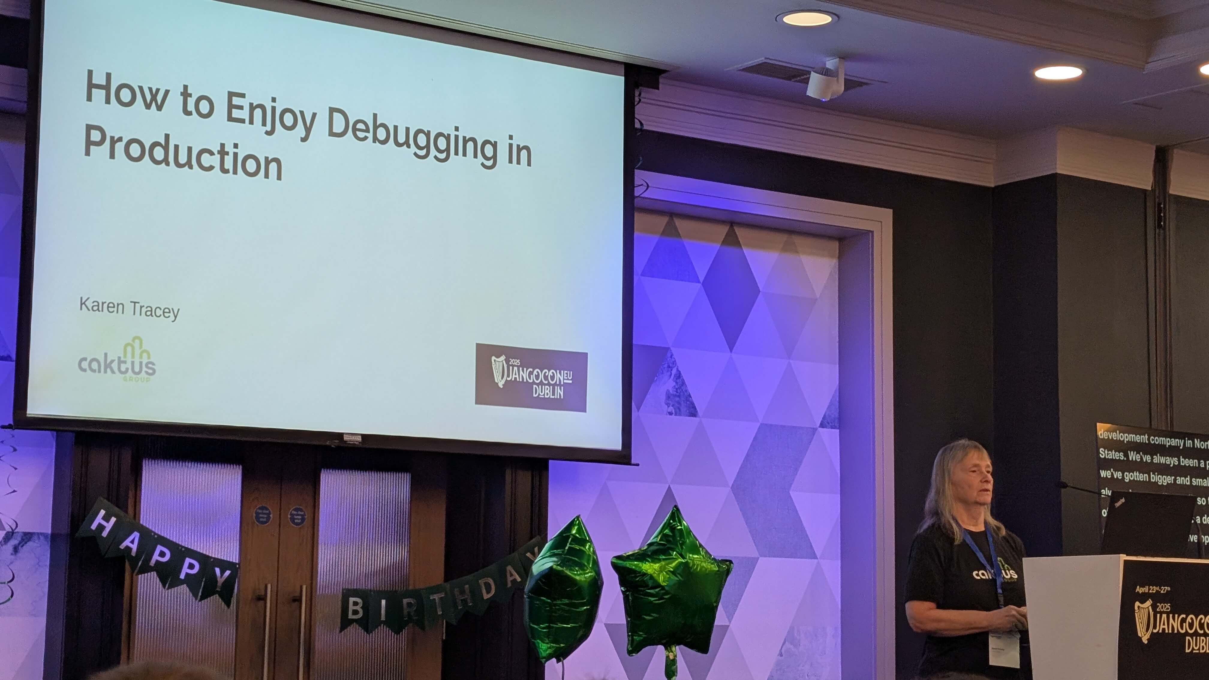 Photo of Karen speaking at DjangoCon about How to Enjoy Debugging in Production