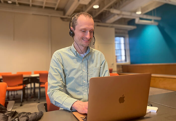 CTO Colin Copeland works on a MacBook Air