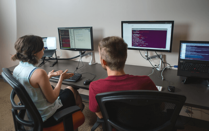 Developers working in front of computer screens