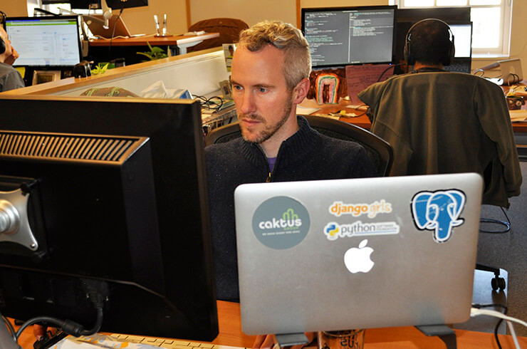 Caktus CEO Tobias McNulty working at his desk